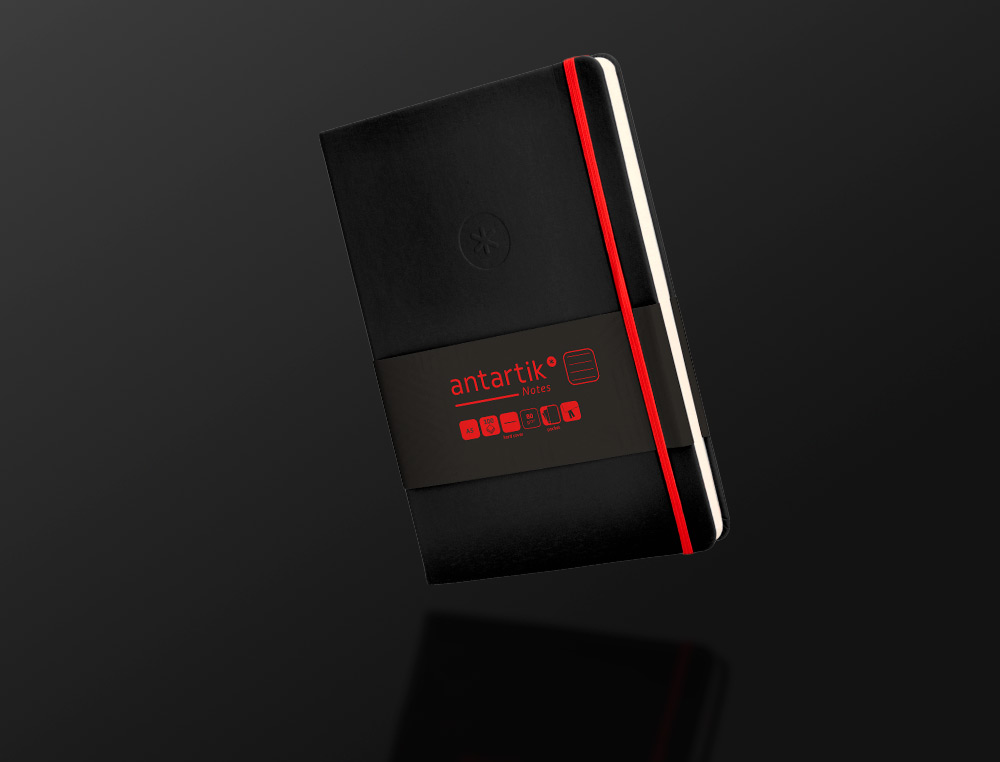 CARNET FERMETURE ELASTIQUE ROUGE ANTARTIK NOTES COUVERTURE RIGIDE A5 LIGNE 100FEUILLES 80GR FSC COLORIS NOIR